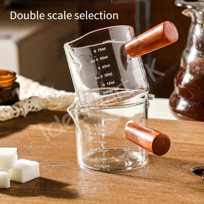 double-nozzle-glass-measuring-cup-with-wooden-handle-dual-scale-product-image
